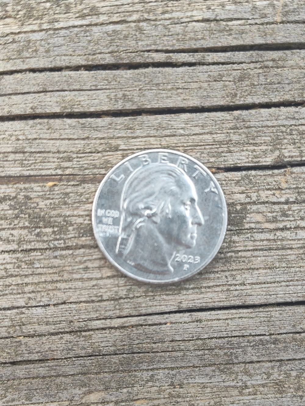 ERROR 2023 P - Jovita Idar Quarter Reads “In Cod We Trust”